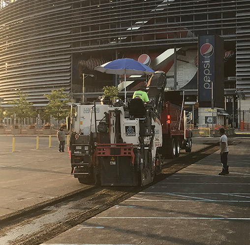 a macchione brothers employees working on stadium parking lot