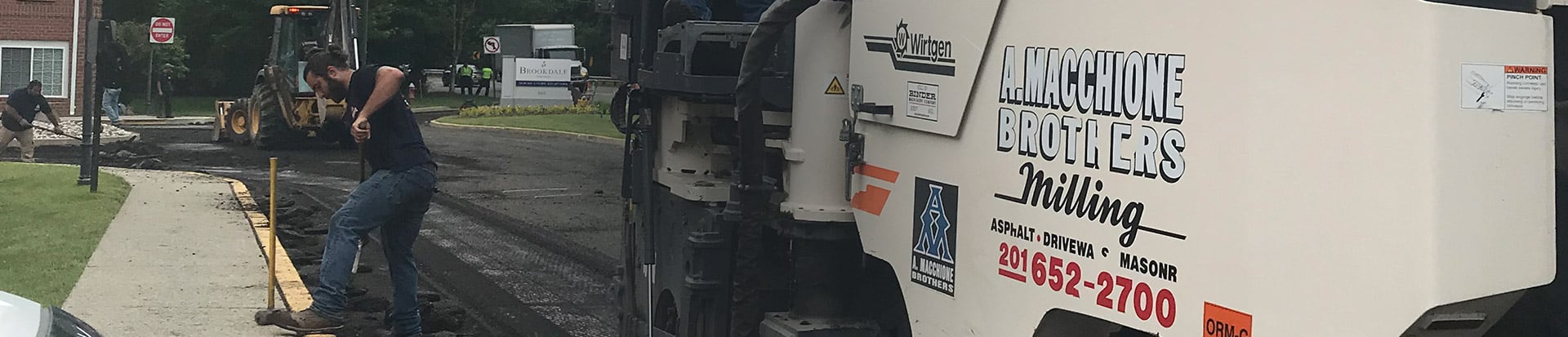 a macchione brothers employees working on road