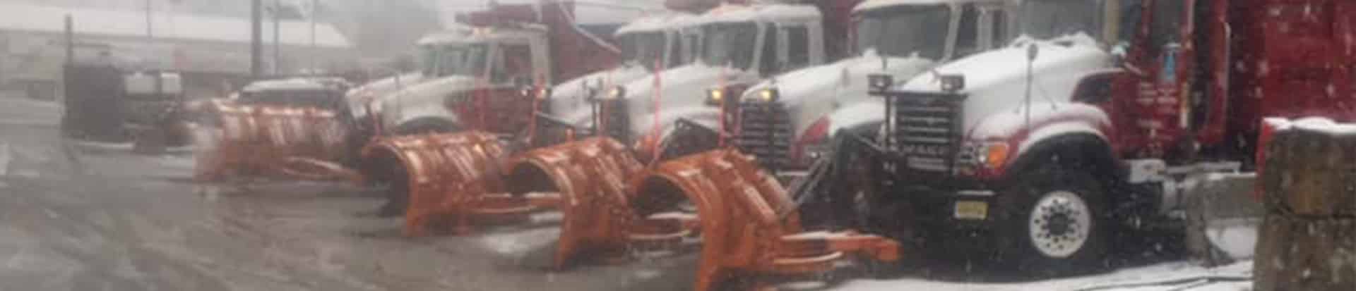 six snowplow trucks