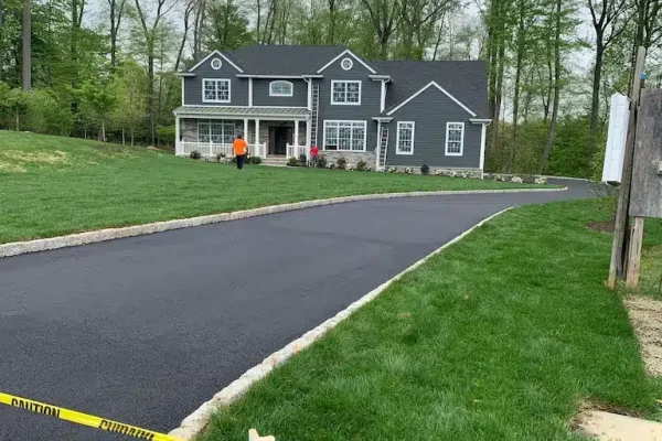 Very Long Home Driveway With Fresh Asphalt